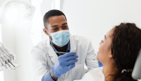 dentist carrying out treatment on patient